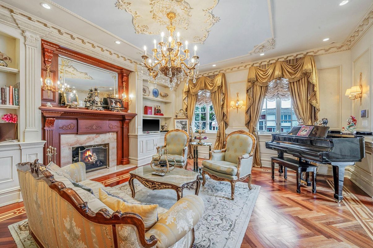 Chandelier, Fireplace, Interior, Living room, Piano, Recessed Lighting, Wood Texture Flooring