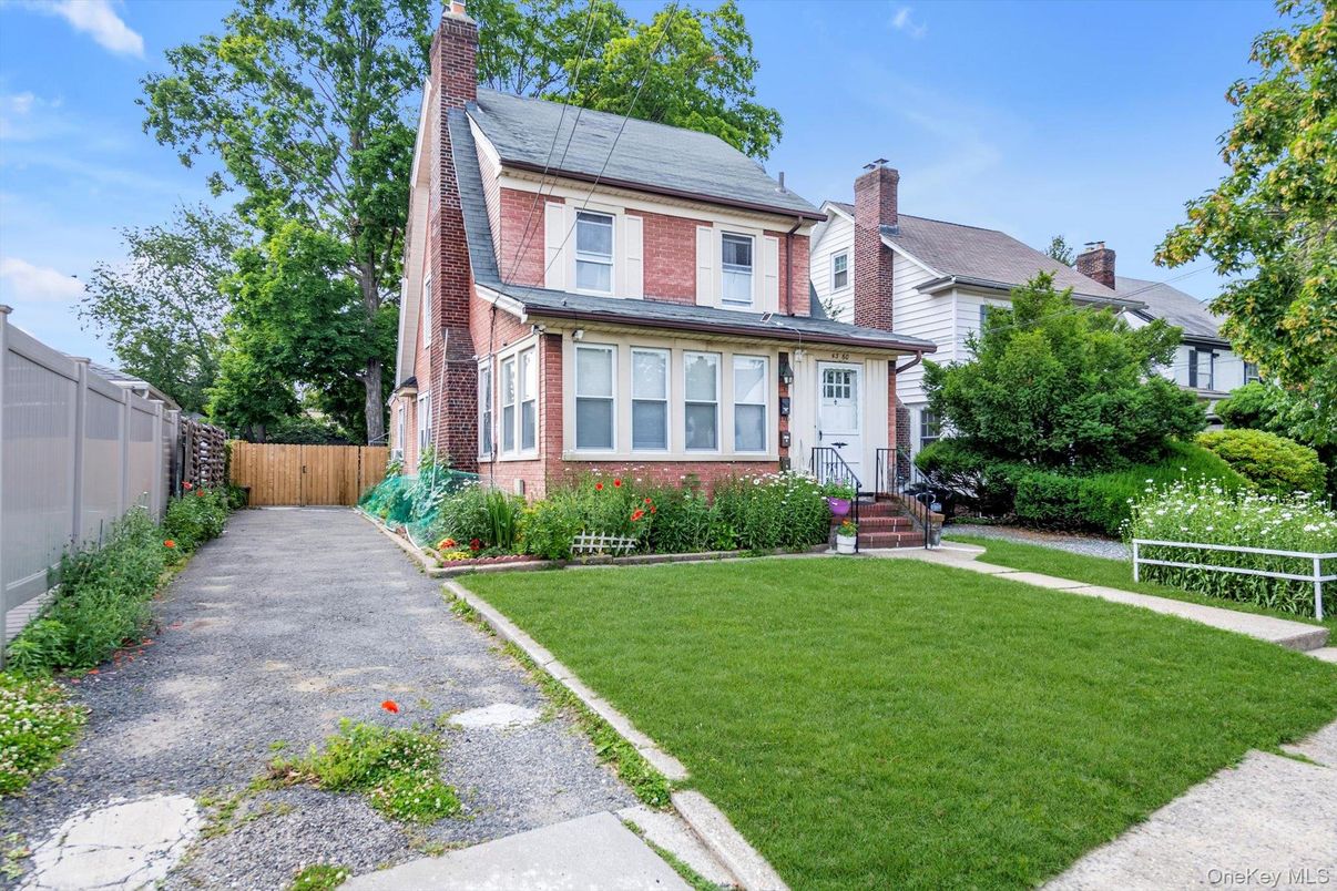 Backyard, Exterior, Facade, Brick Facade, Solar Panels, Queen Anne Victorian
