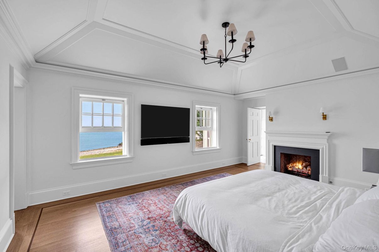 Bedroom, Chandelier, Fireplace, Interior, Water, Wood Texture Flooring