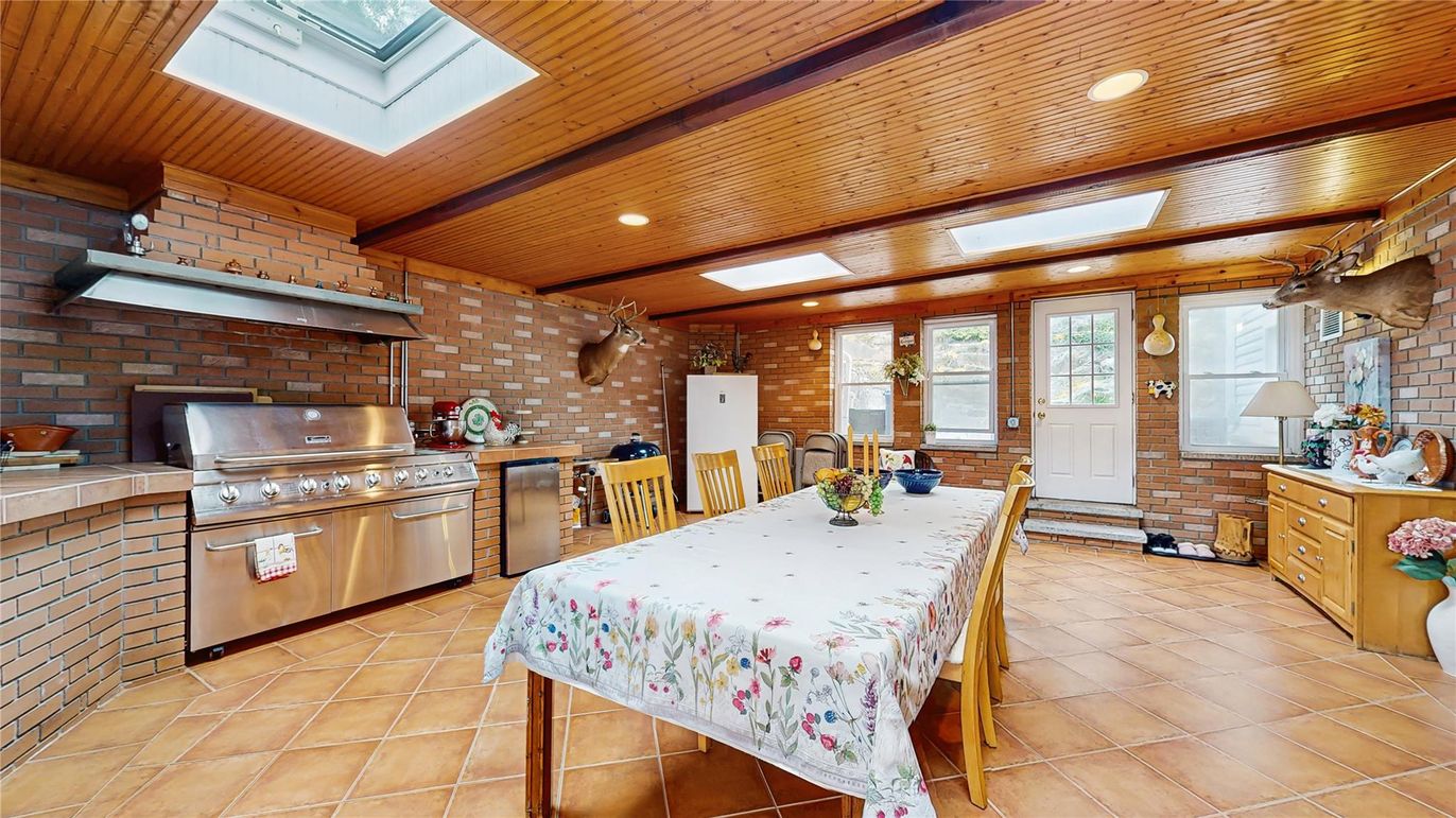 Dining room, Interior, Kitchen, Recessed Lighting, Stainless Steel Appliances, Stone Walls, Wooden Beams, Wooden Ceilings