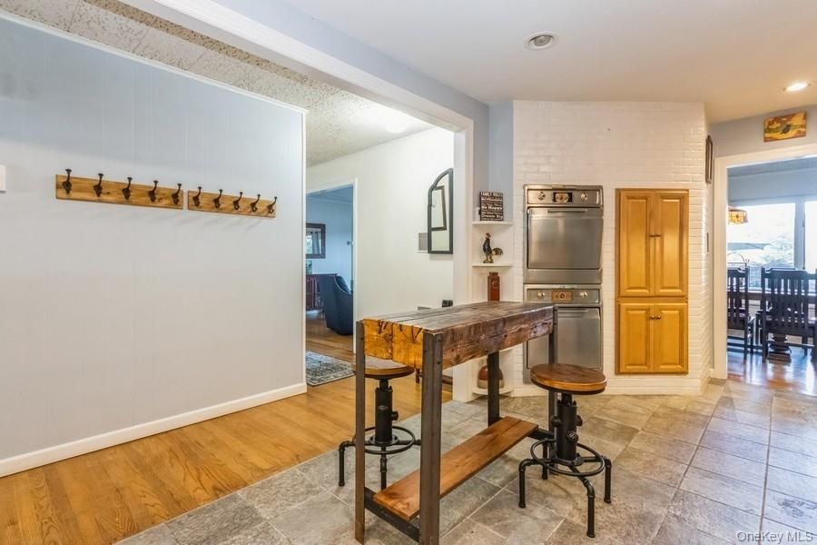 Dining room, Interior, Kitchen, Recessed Lighting, Stainless Steel Appliances, Wood Texture Flooring
