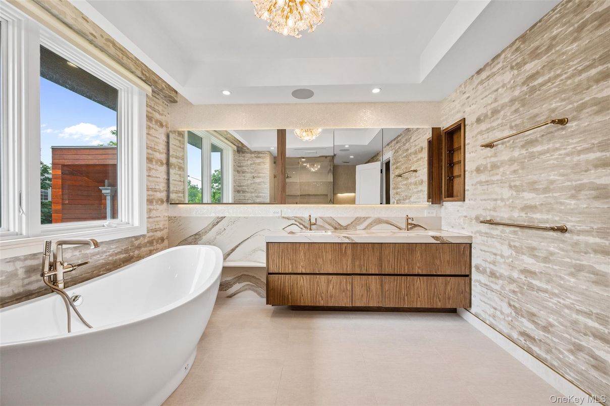 Bathroom, Chandelier, Dual Sink Vanities, Free Standing Baths, Interior, Recessed Lighting, Stone Walls