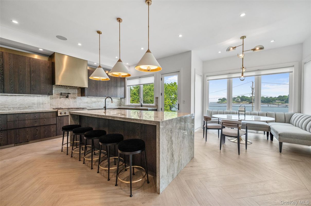 Dining room, Interior, Kitchen, Pendant Lights, Recessed Lighting, Stainless Steel Appliances, Water, Wood Texture Flooring