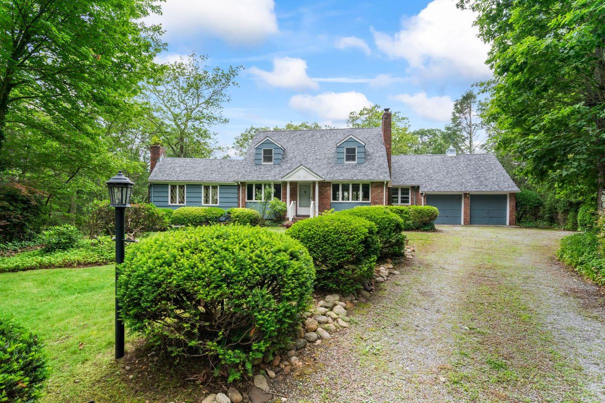 Attached, Backyard, Exterior, Facade, Brick Facade, Cape Cod