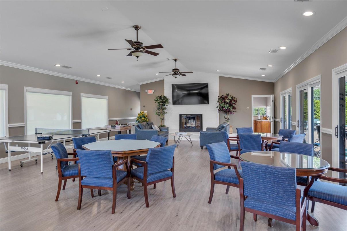 Dining room, Fireplace, Interior, Living room, Recessed Lighting, Wood Texture Flooring