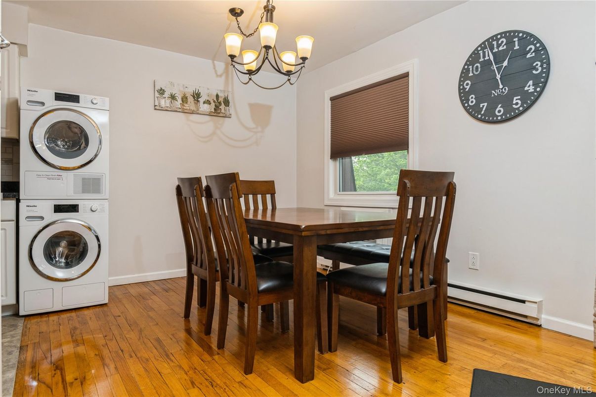 Chandelier, Dining room, Interior, Utility Closets, Washer, Wood Texture Flooring