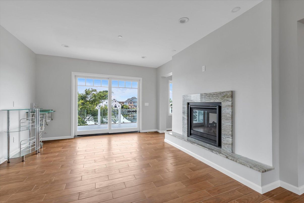 Empty room, Fireplace, Interior, Recessed Lighting, Wood Texture Flooring