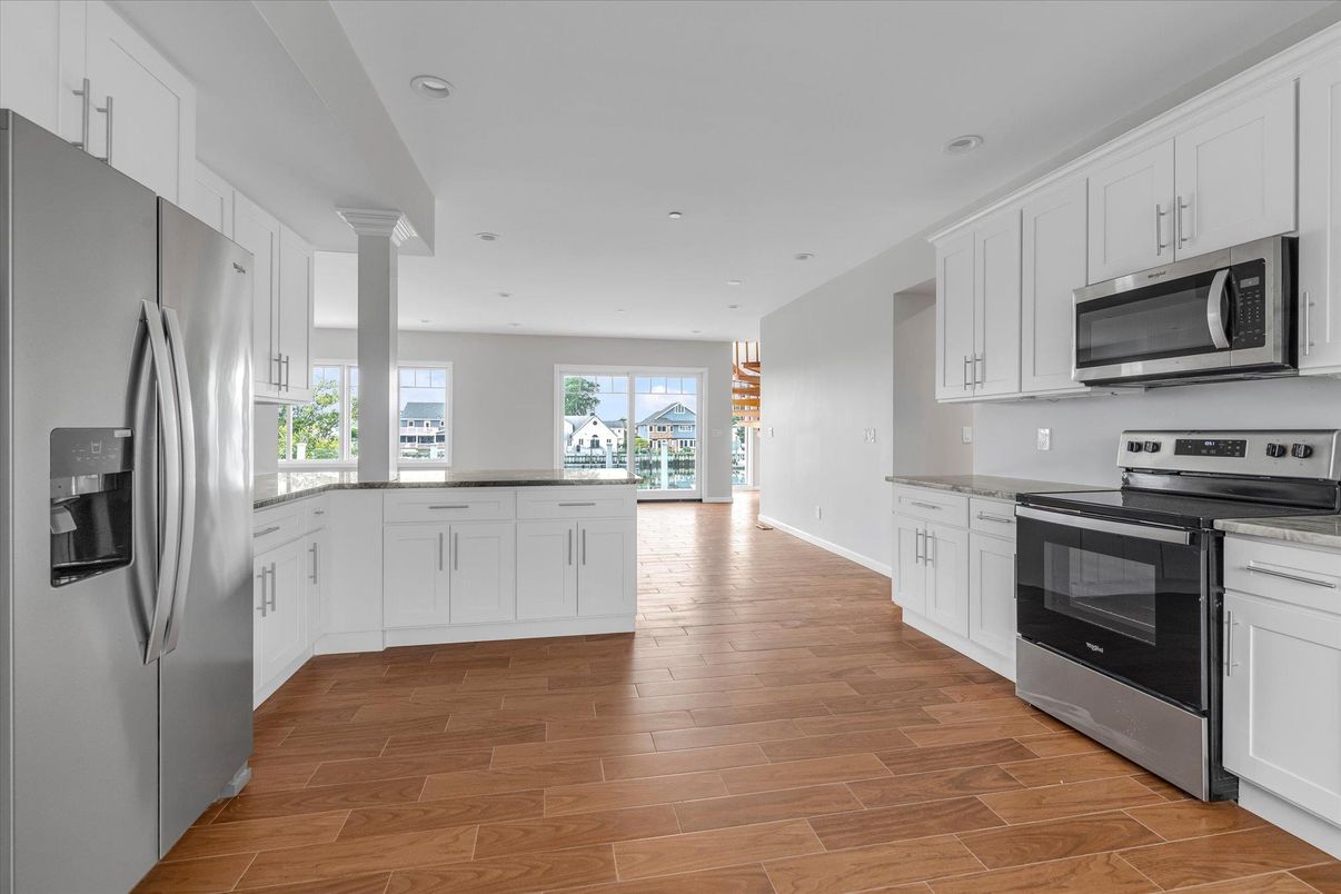 Interior, Kitchen, Recessed Lighting, Stainless Steel Appliances, Wood Texture Flooring