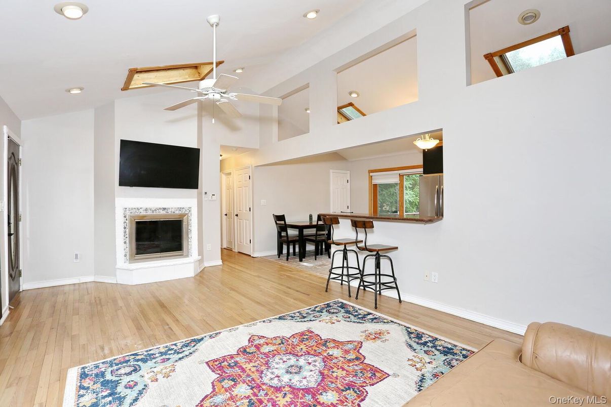 Dining room, Fireplace, Interior, Recessed Lighting, Wood Texture Flooring
