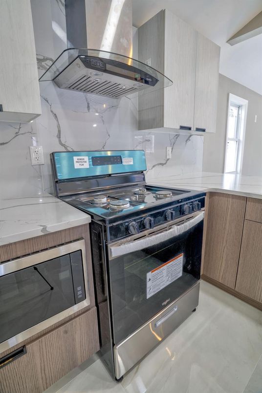 Interior, Kitchen, Marble Walls, Stainless Steel Appliances