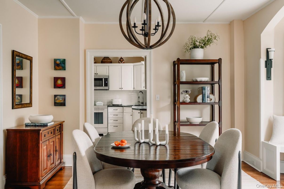 Chandelier, Dining room, Interior, Kitchen, Stainless Steel Appliances, Wood Texture Flooring