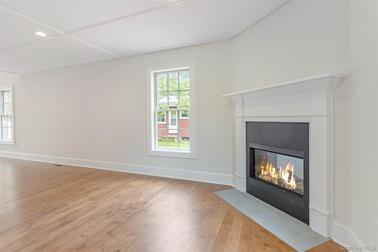 Empty room, Fireplace, Interior, Recessed Lighting, Wood Texture Flooring