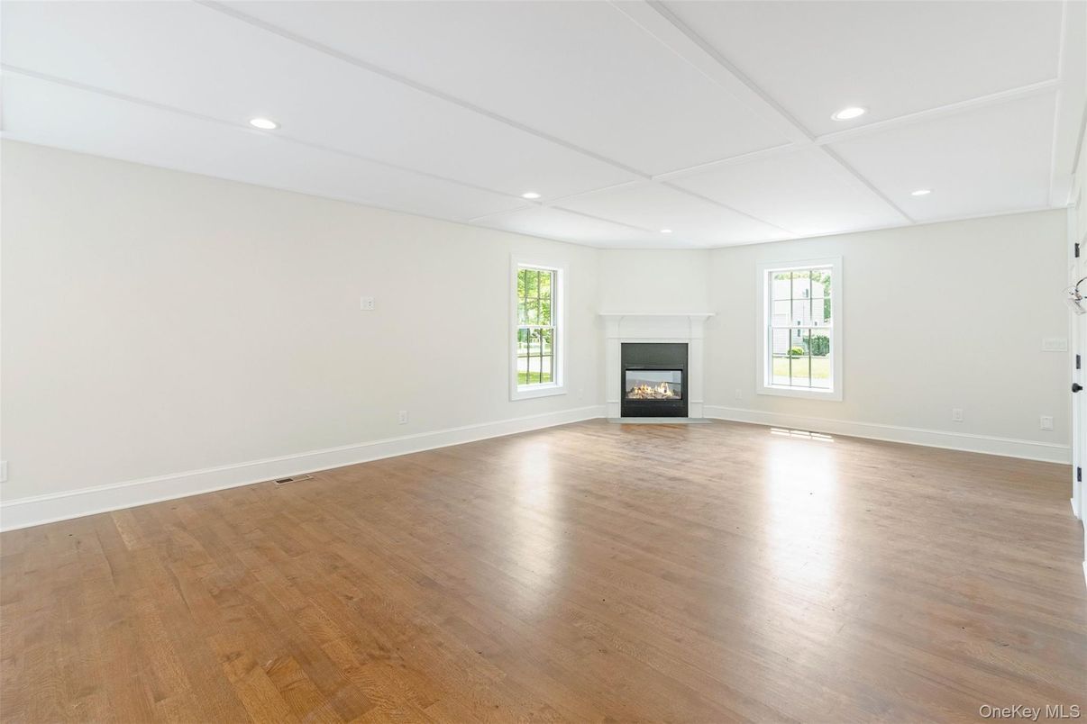 Empty room, Fireplace, Interior, Recessed Lighting, Wood Texture Flooring