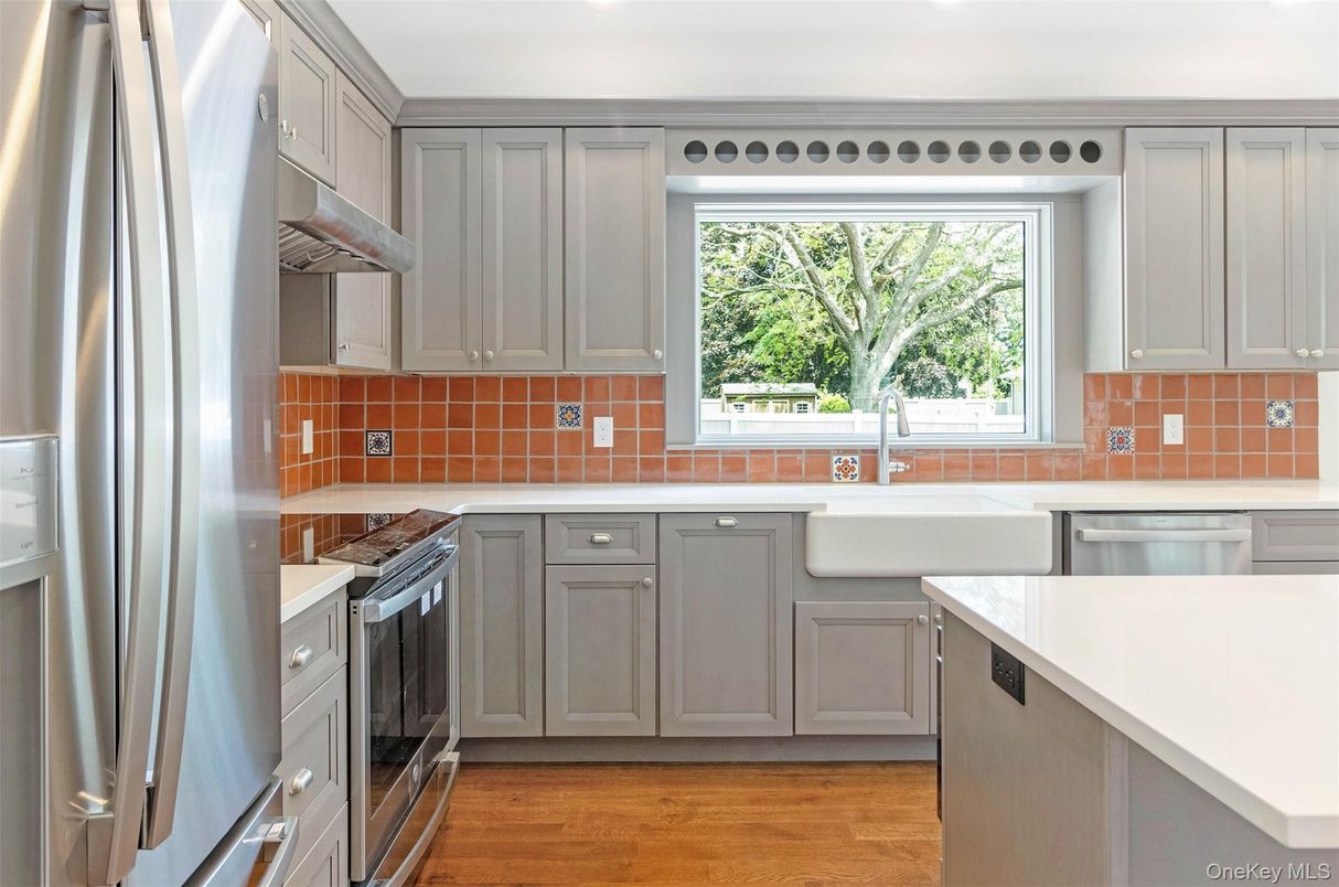 Interior, Kitchen, Stainless Steel Appliances, Tile Countertops, Wood Texture Flooring