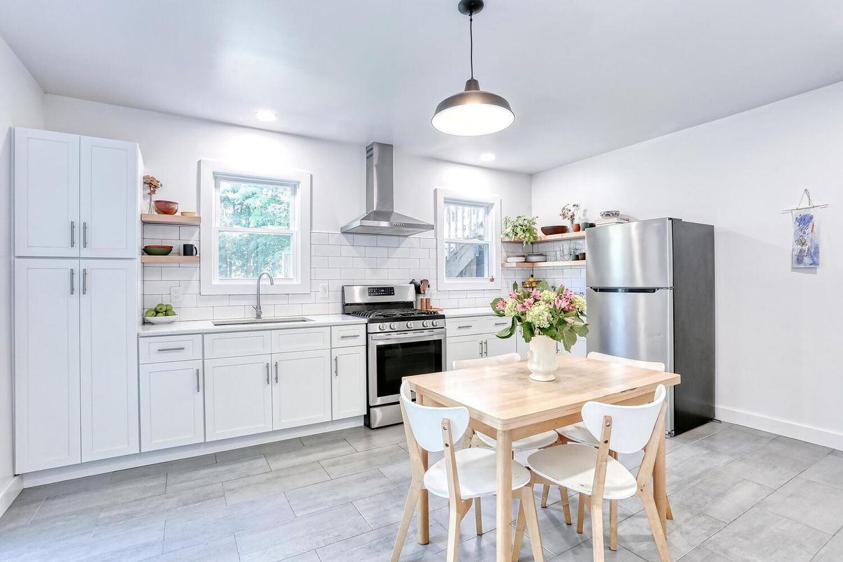 Dining room, Interior, Kitchen, Pendant Lights, Recessed Lighting, Stainless Steel Appliances, Wood Texture Flooring