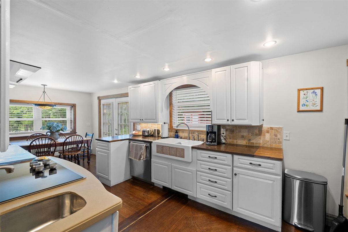 Dining room, Interior, Kitchen, Recessed Lighting, Stainless Steel Appliances, Wood Texture Flooring