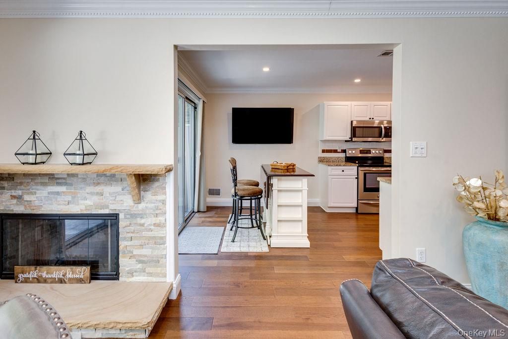 Fireplace, Interior, Kitchen, Recessed Lighting, Wood Texture Flooring
