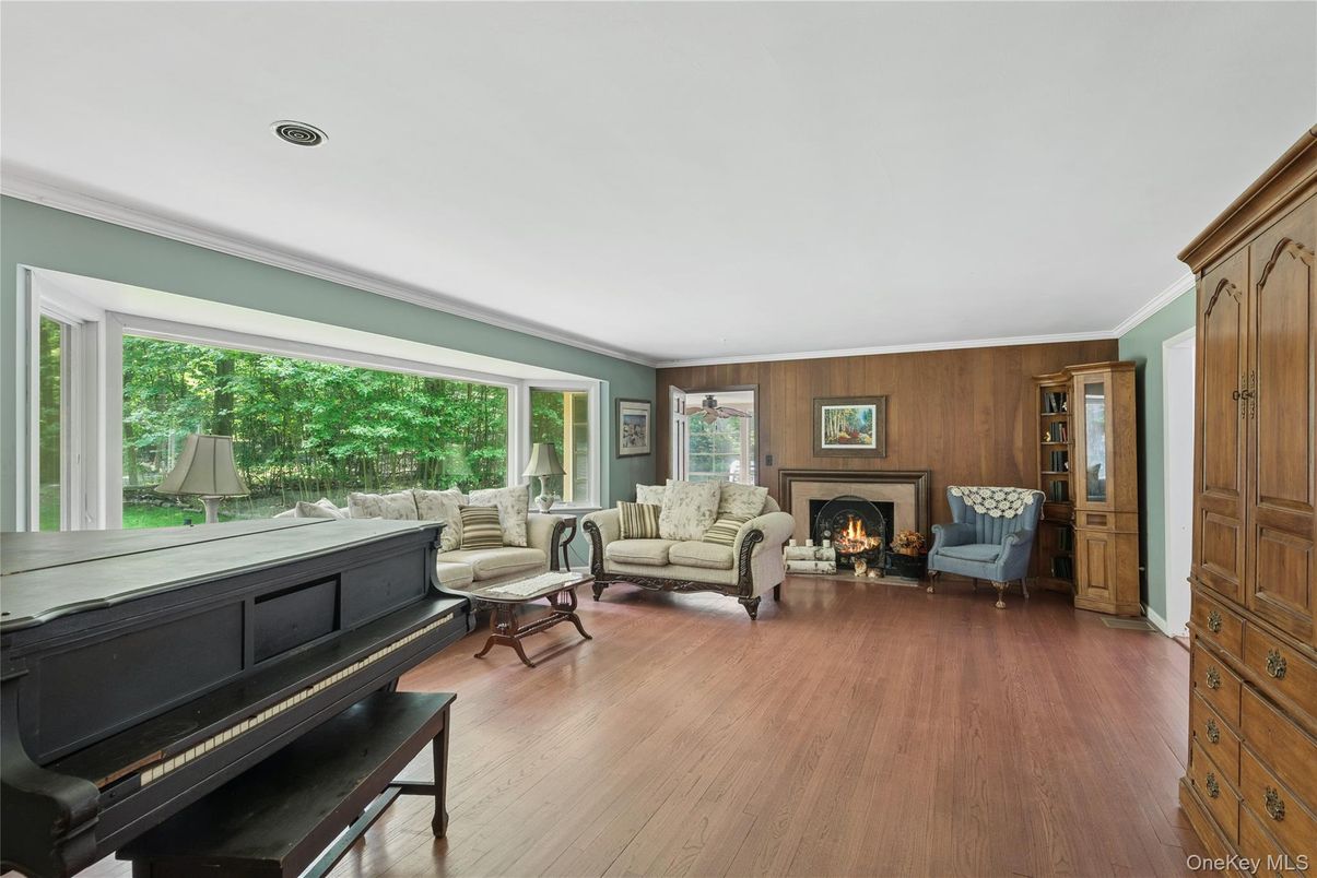 Fireplace, Interior, Living room, Piano, Wood Texture Flooring, Wooden Walls