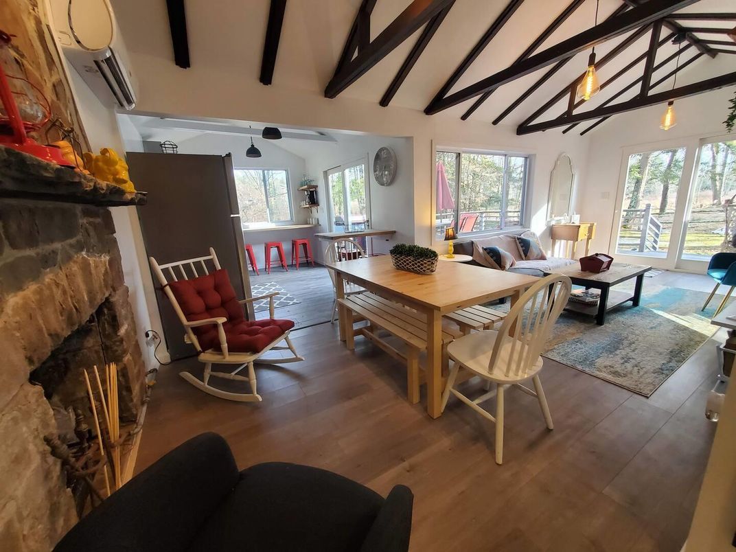 Dining room, Fireplace, Interior, Living room, Pendant Lights, Wooden Beams, Wood Texture Flooring