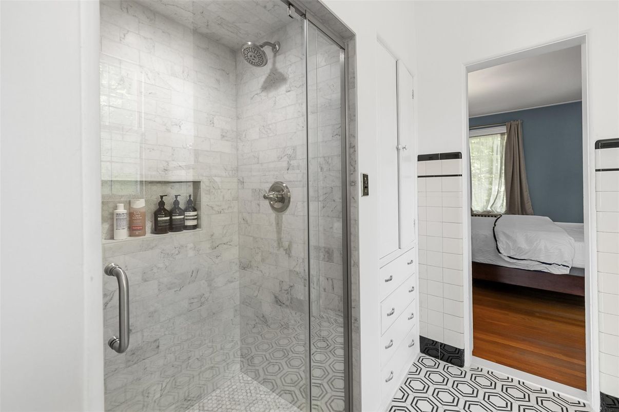 Bathroom, Glass Shower, Interior, Marble Walls, Wood Texture Flooring