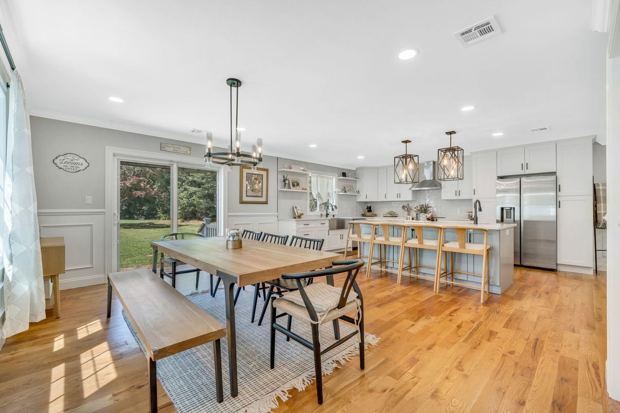 Dining room, Interior, Kitchen, Pendant Lights, Recessed Lighting, Stainless Steel Appliances, Wood Texture Flooring