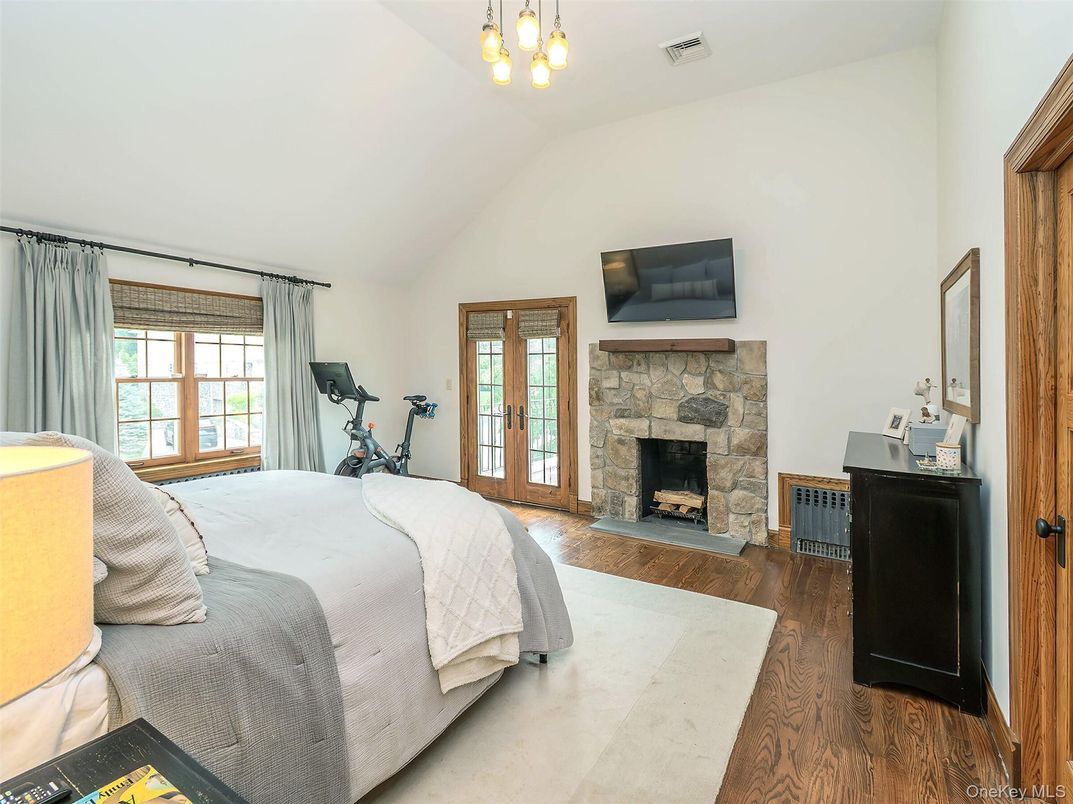 Bedroom, Fireplace, Fitness Equipment, Interior, Wood Texture Flooring