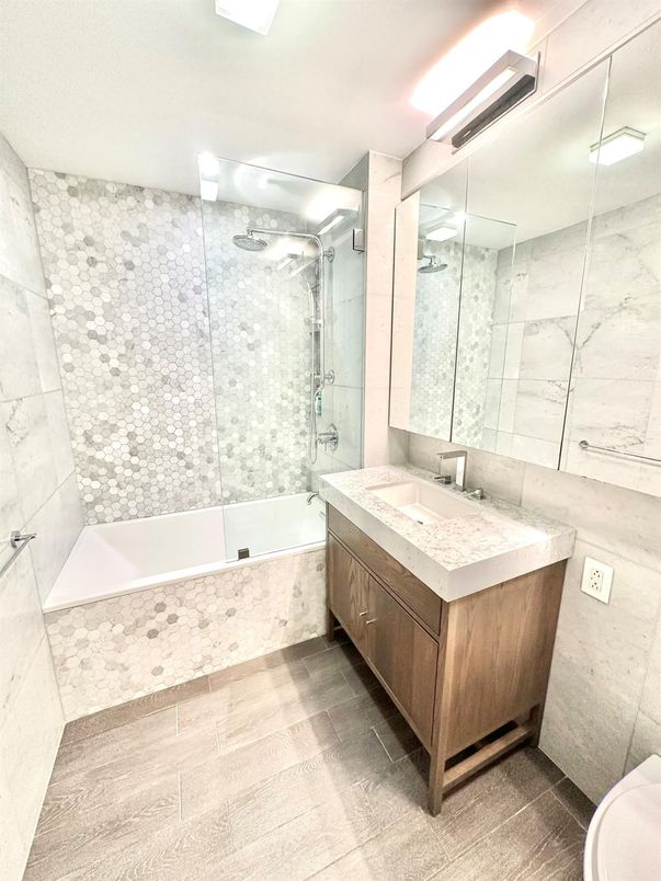 Bathroom, Glass Shower, Interior, Marble Walls, Wood Texture Flooring