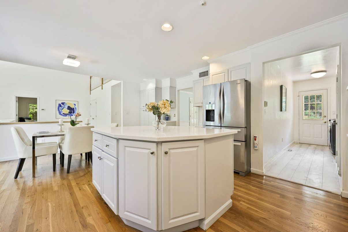 Dining room, Interior, Kitchen, Recessed Lighting, Stainless Steel Appliances, Wood Texture Flooring