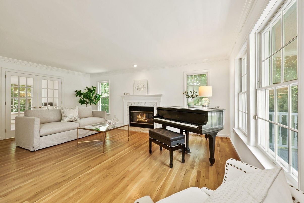 Fireplace, Interior, Living room, Piano, Recessed Lighting, Wood Texture Flooring