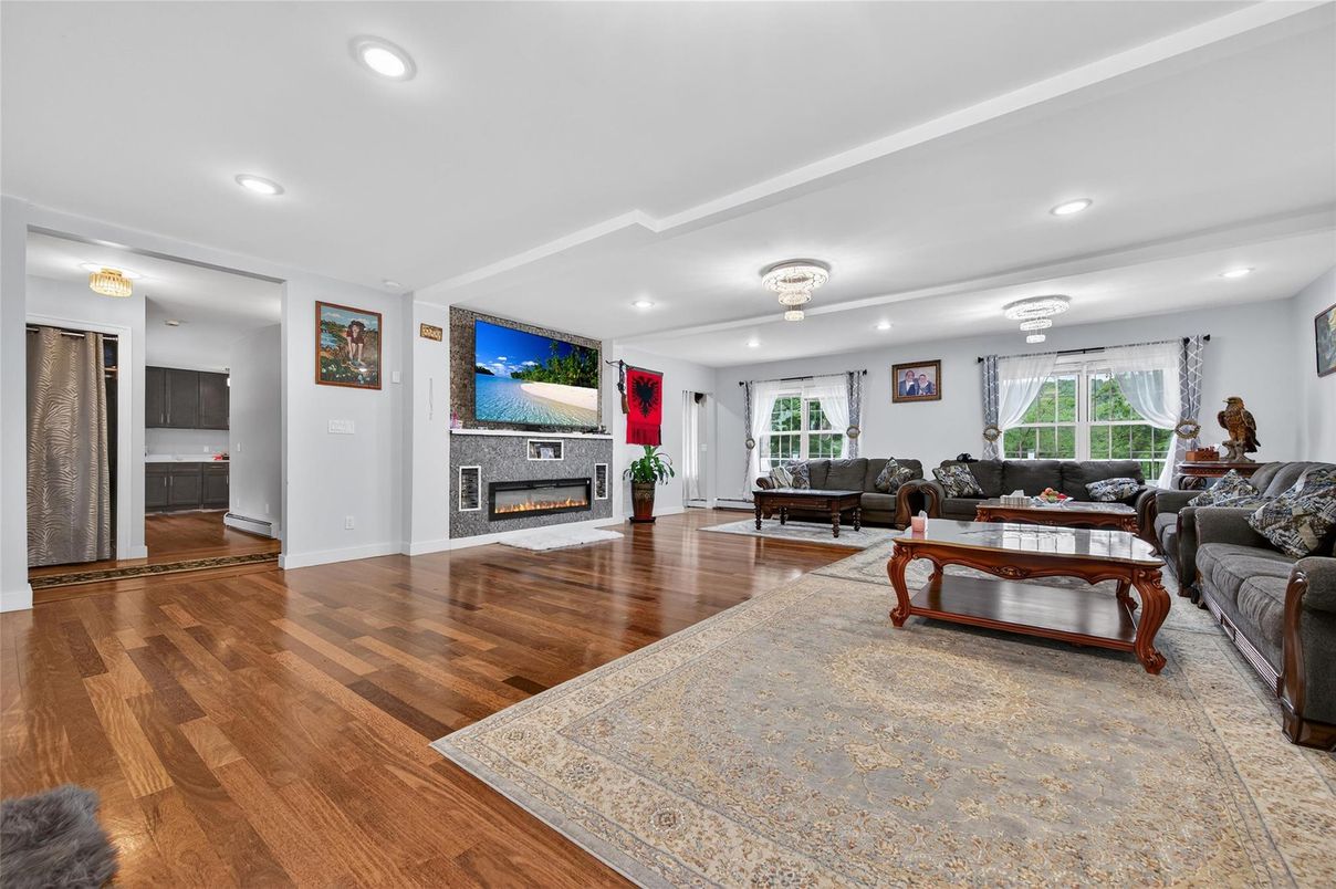 Fireplace, Interior, Living room, Recessed Lighting, Wood Texture Flooring