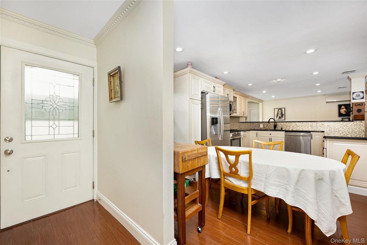 Dining room, Interior, Kitchen, Recessed Lighting, Stainless Steel Appliances, Wood Texture Flooring