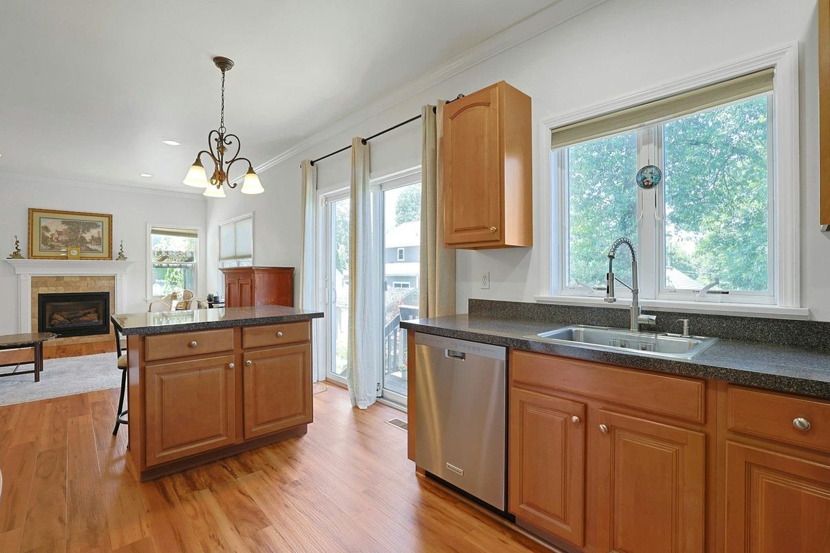 Fireplace, Interior, Kitchen, Pendant Lights, Recessed Lighting, Wood Texture Flooring