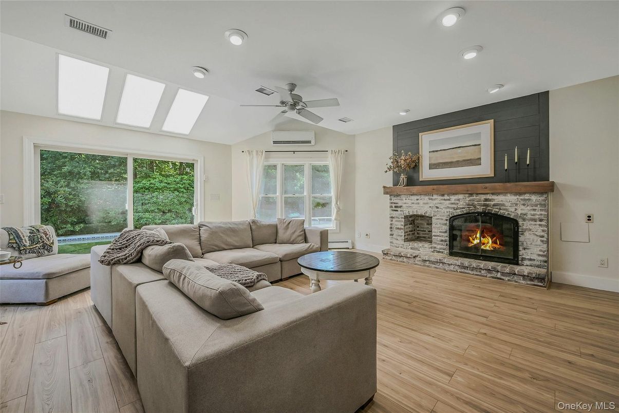 Fireplace, Interior, Living room, Recessed Lighting, Wood Texture Flooring