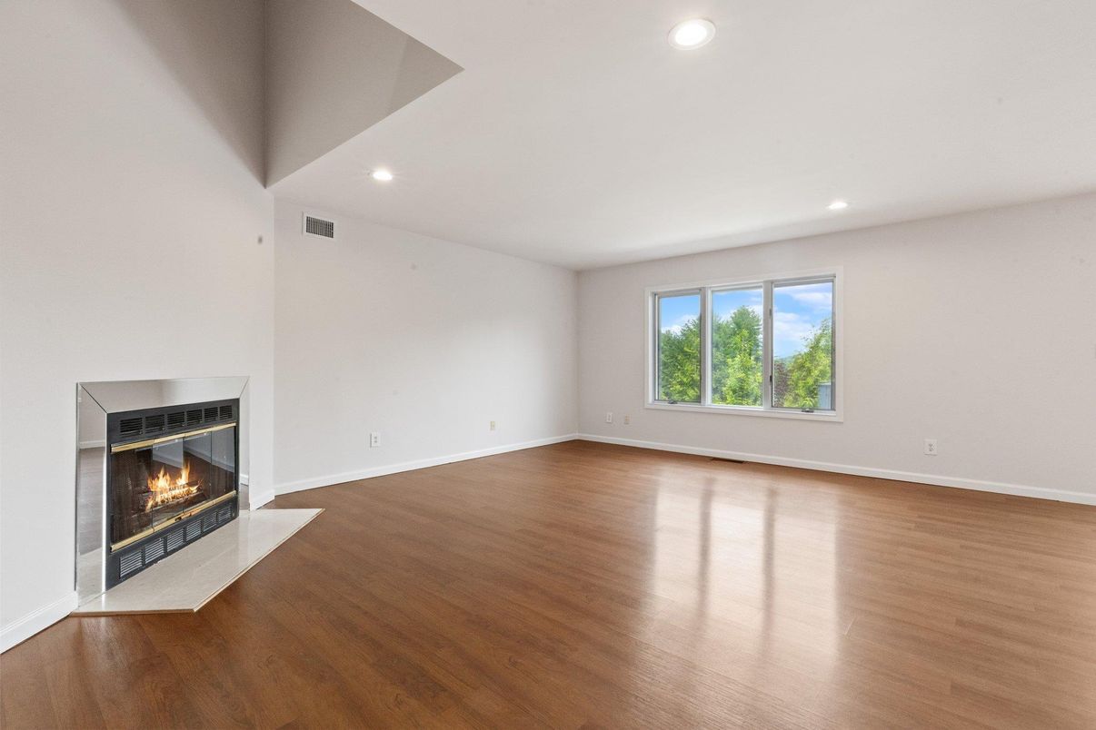 Empty room, Fireplace, Interior, Recessed Lighting, Wood Texture Flooring