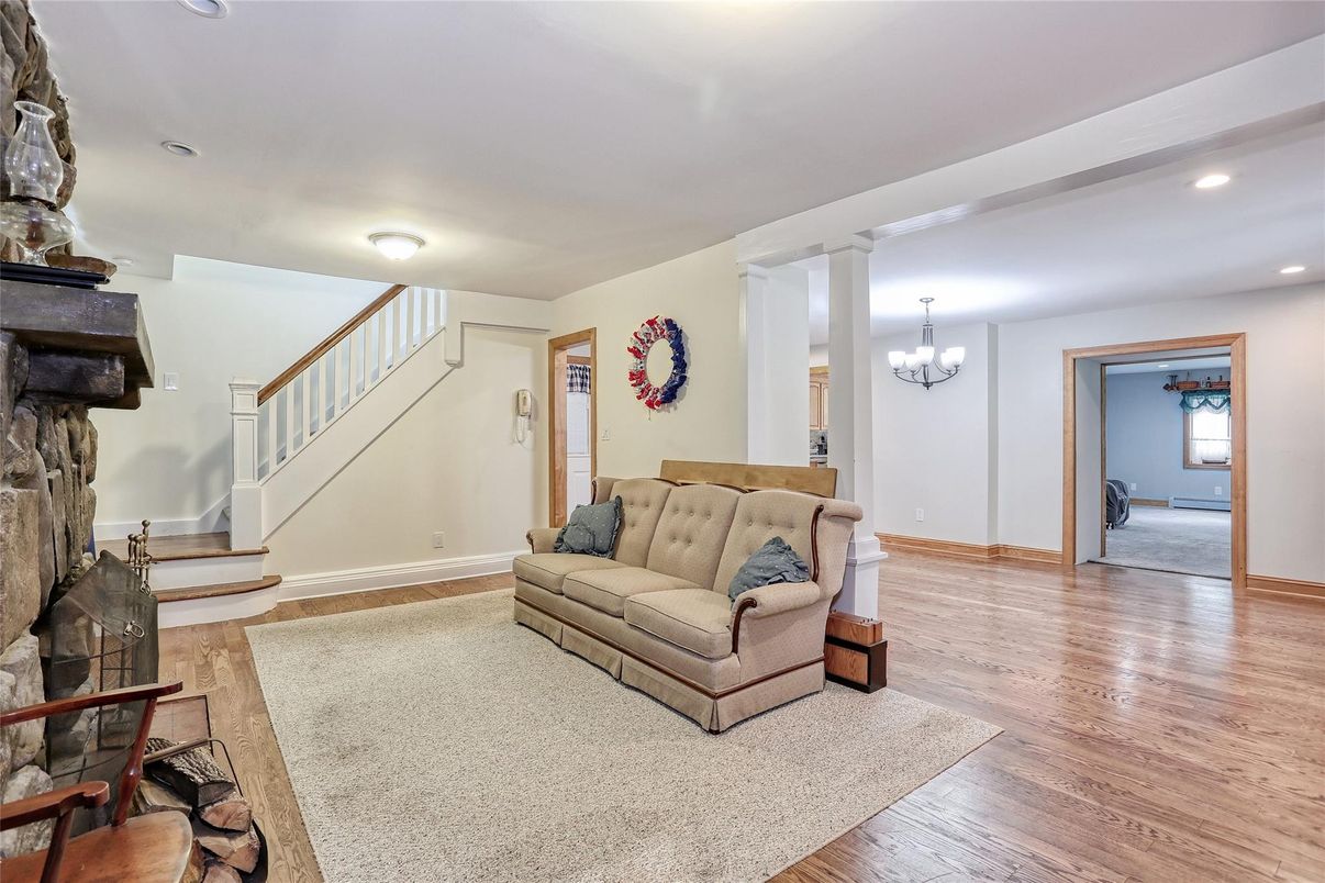 Chandelier, Fireplace, Interior, Recessed Lighting, Wood Texture Flooring