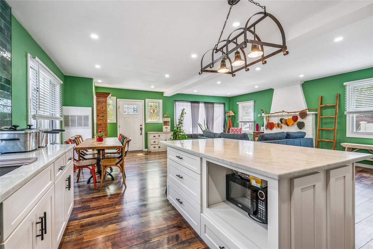 Dining room, Interior, Kitchen, Recessed Lighting, Stainless Steel Appliances, Wood Texture Flooring