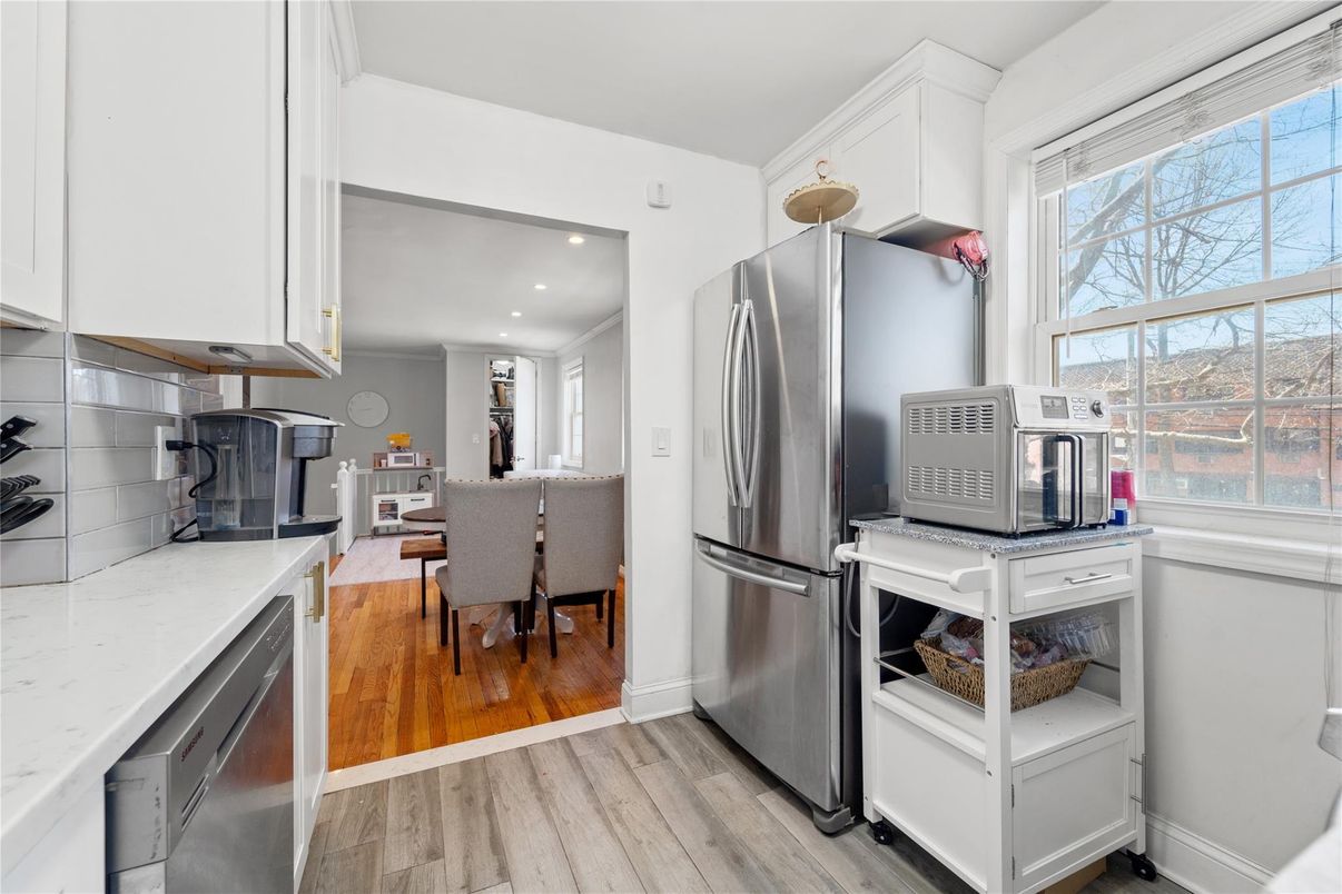 Dining room, Interior, Kitchen, Recessed Lighting, Stainless Steel Appliances, Wood Texture Flooring