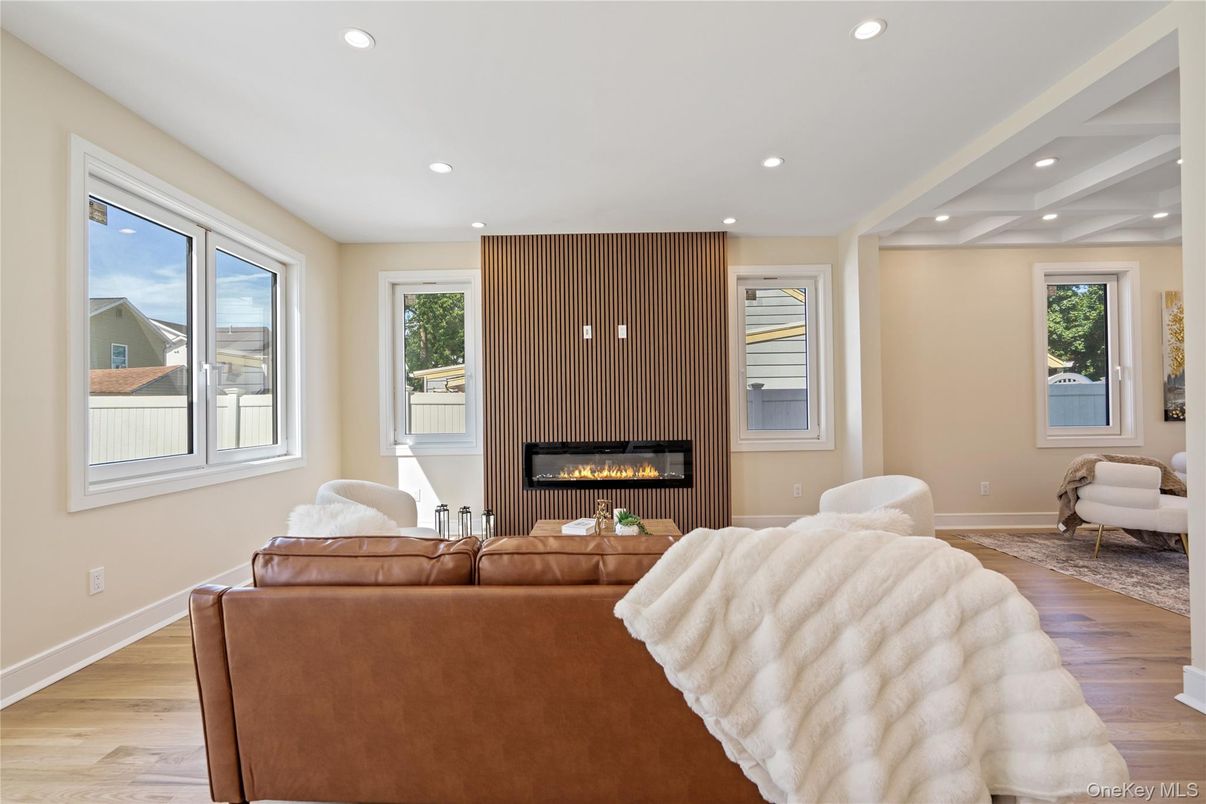Fireplace, Interior, Living room, Recessed Lighting, Wood Texture Flooring