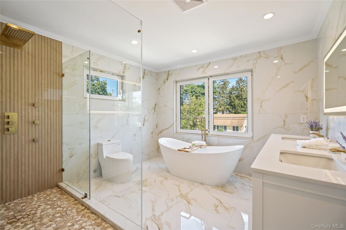 Bathroom, Dual Sink Vanities, Free Standing Baths, Glass Shower, Interior, Marble, Marble Walls, Recessed Lighting