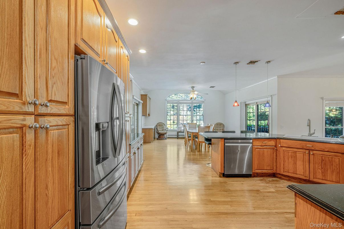 Dining room, Interior, Kitchen, Pendant Lights, Recessed Lighting, Stainless Steel Appliances, Wood Texture Flooring