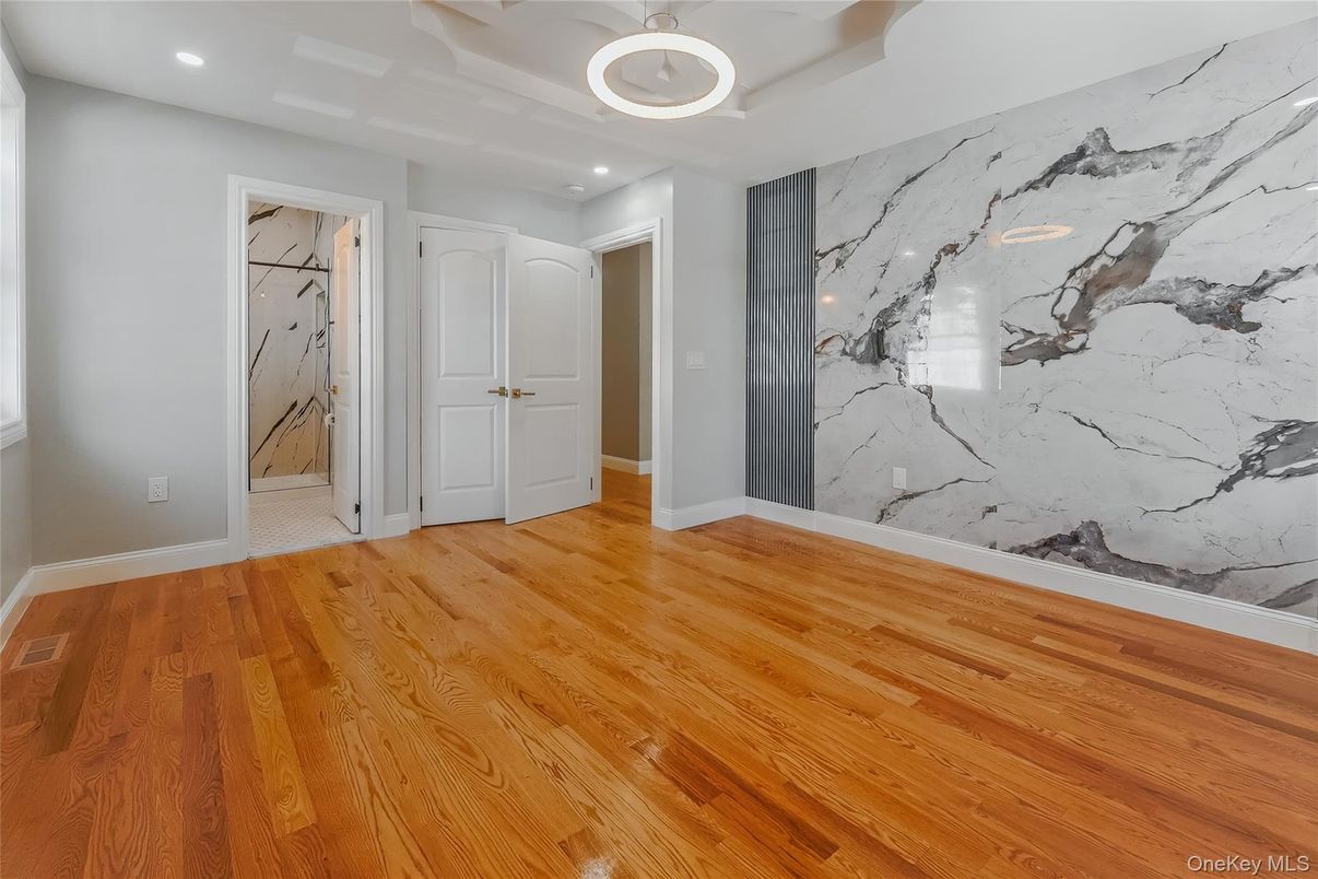 Empty room, Interior, Marble Walls, Recessed Lighting, Wood Texture Flooring