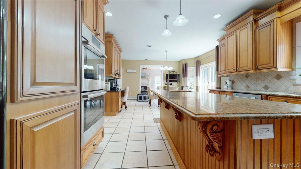 Dining room, Fireplace, Interior, Kitchen, Pendant Lights, Recessed Lighting, Stainless Steel Appliances