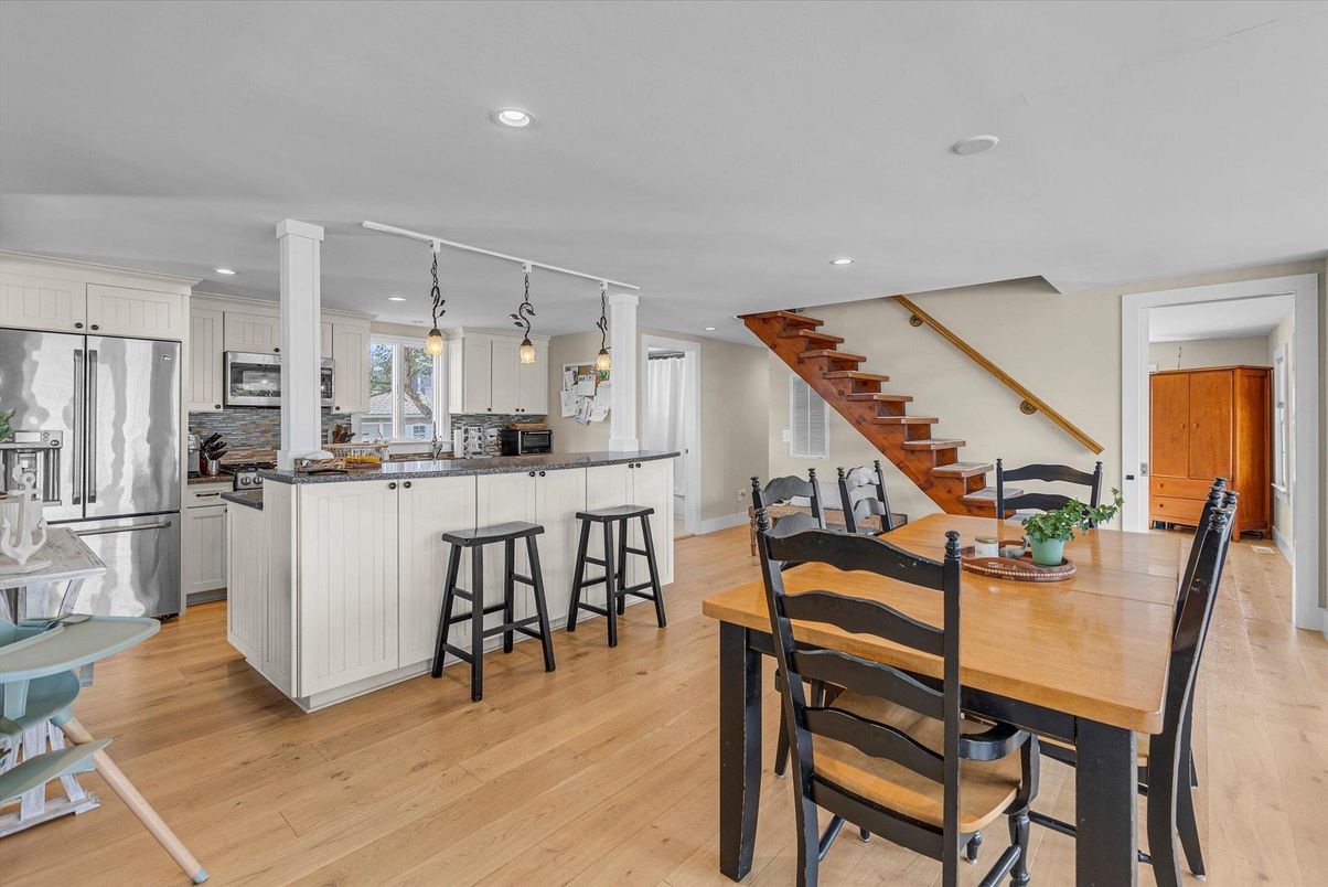 Dining room, Interior, Kitchen, Pendant Lights, Recessed Lighting, Stainless Steel Appliances, Wood Texture Flooring