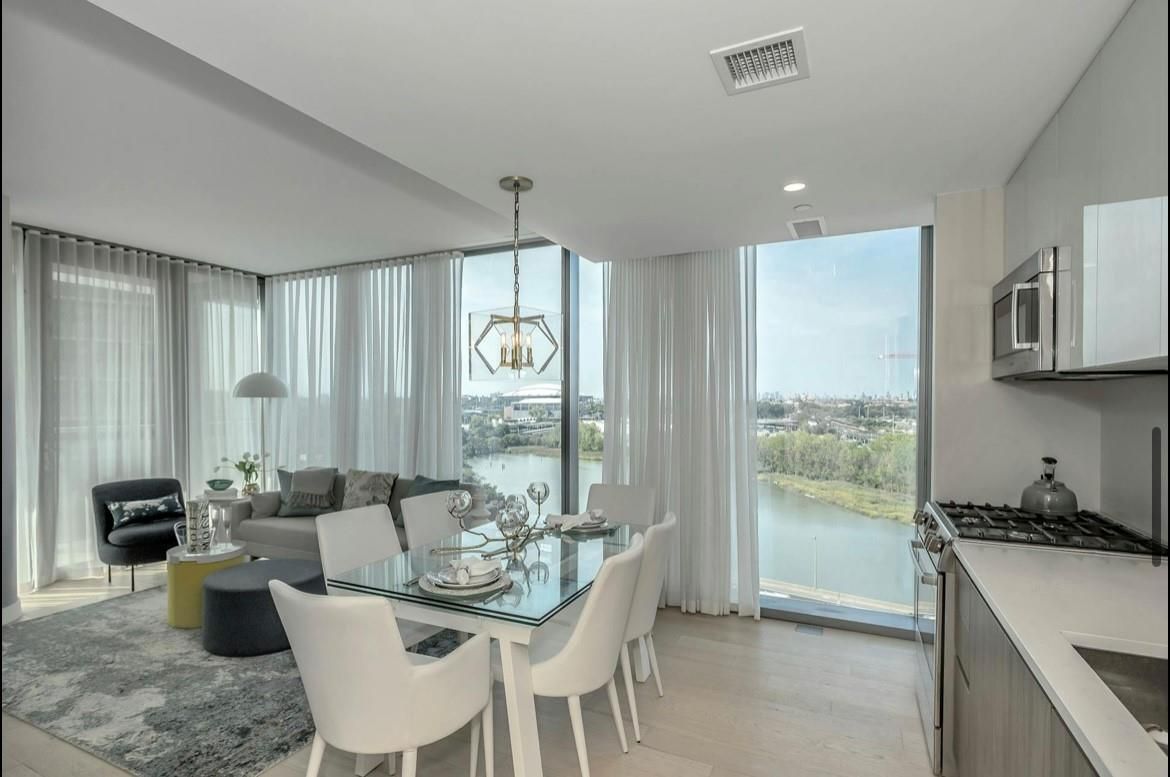 Chandelier, Dining room, Interior, Living room, Pendant Lights, Recessed Lighting, Water, Wood Texture Flooring