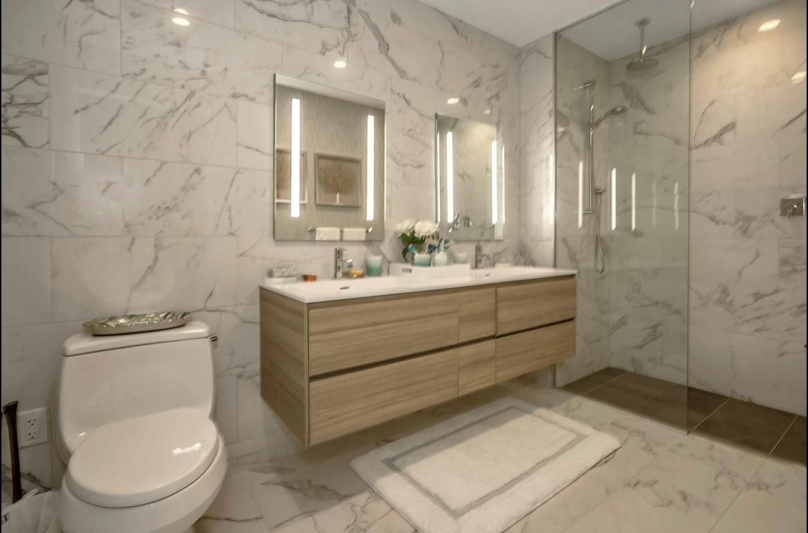 Bathroom, Dual Sink Vanities, Glass Shower, Interior, Marble, Marble Walls, Recessed Lighting