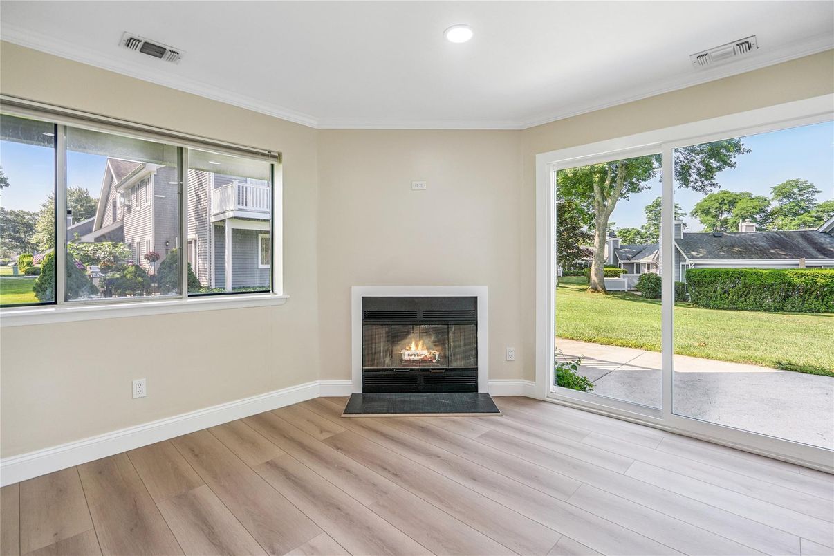 Empty room, Fireplace, Interior, Recessed Lighting, Wood Texture Flooring