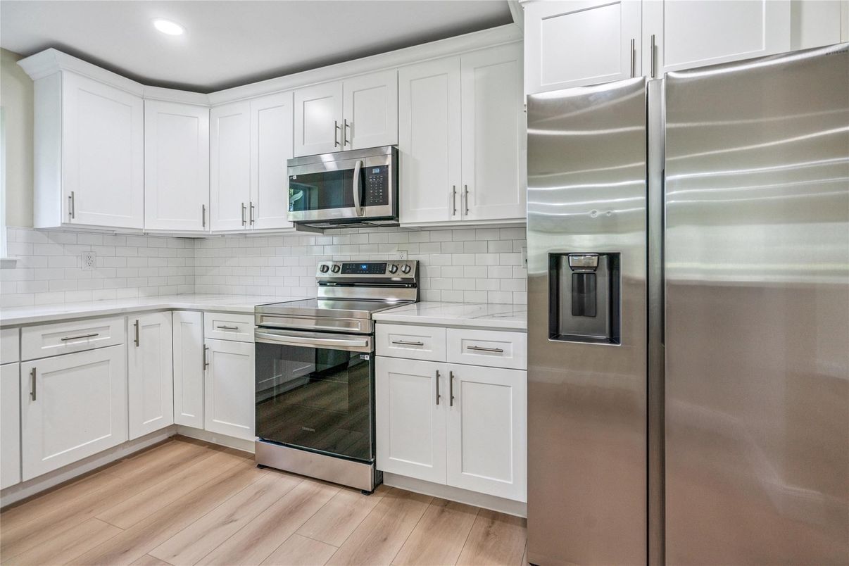 Interior, Kitchen, Recessed Lighting, Stainless Steel Appliances, Wood Texture Flooring