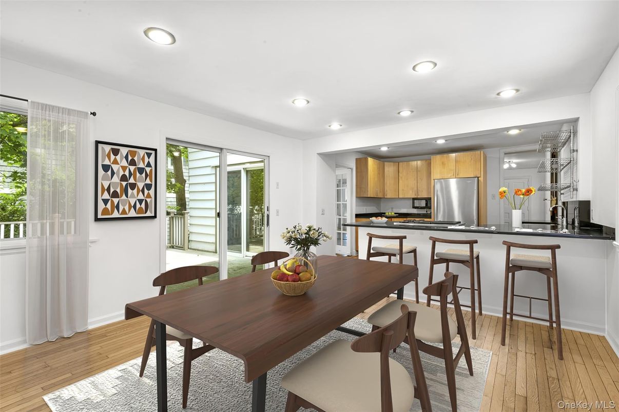 Dining room, Interior, Kitchen, Recessed Lighting, Stainless Steel Appliances, Wood Texture Flooring