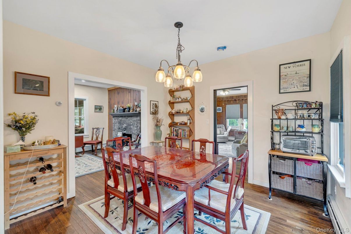 Dining room, Fireplace, Interior, Pendant Lights, Wood Texture Flooring