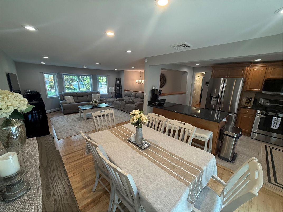 Dining room, Interior, Kitchen, Living room, Recessed Lighting, Stainless Steel Appliances, Wood Texture Flooring